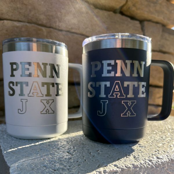 insulated coffee mug in navy and white with an engraved Penn State Jax logo