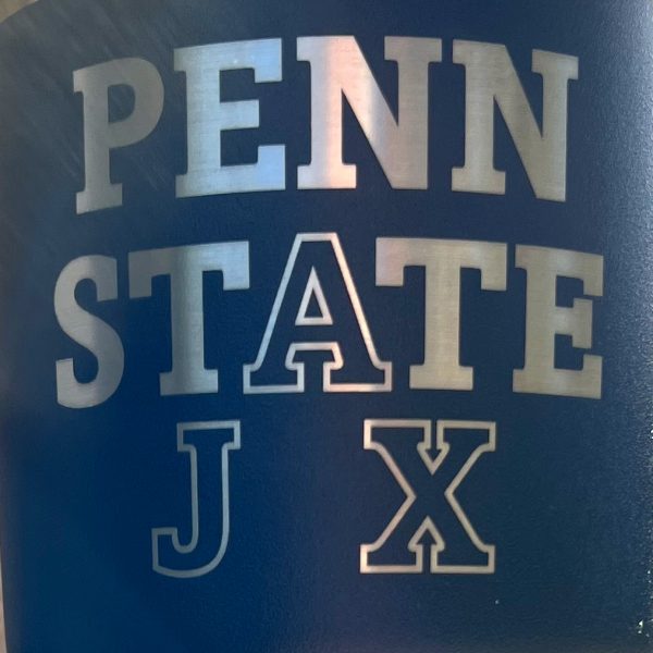 Penn State Jax logo engraved on a navy background
