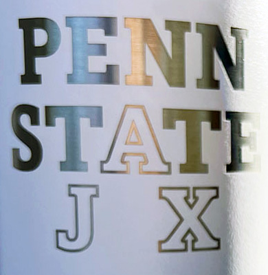 Penn State Jax Logo engraved on a white background